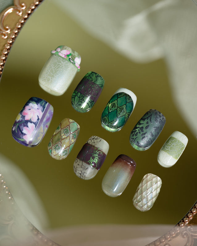 Green press on nails with hand-painted  floral nail art