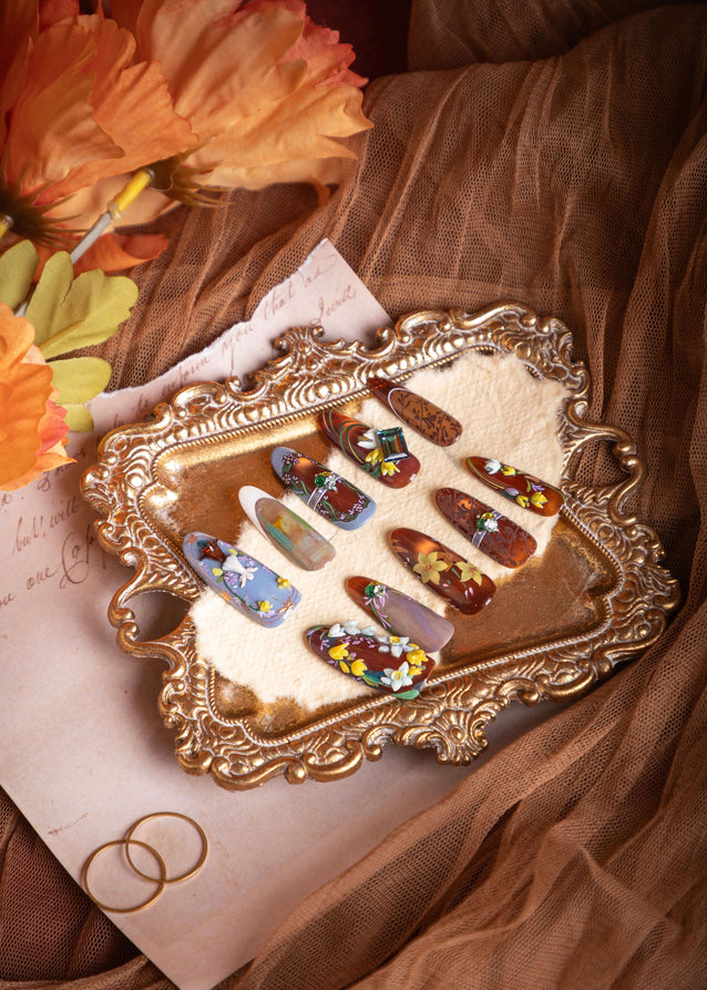 ZIYURA handcrafted brown press on nails with floral designs and gemstone accents in warm brown tones