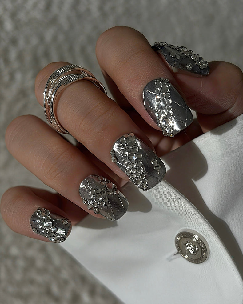 Luxury silver press on nails featuring a lace pattern and crystal accents